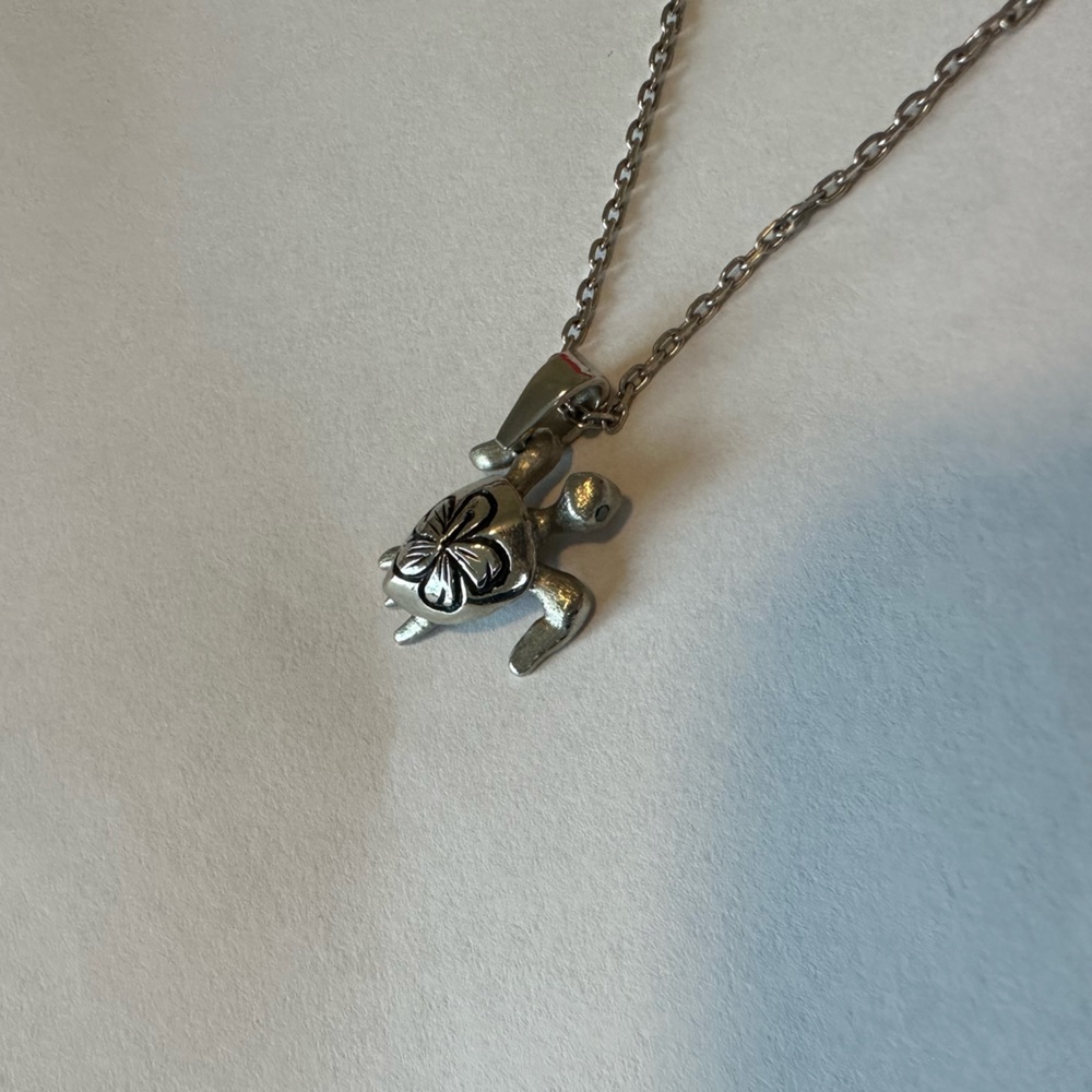 Handmade hibiscus sea turtle necklace with gem eyes